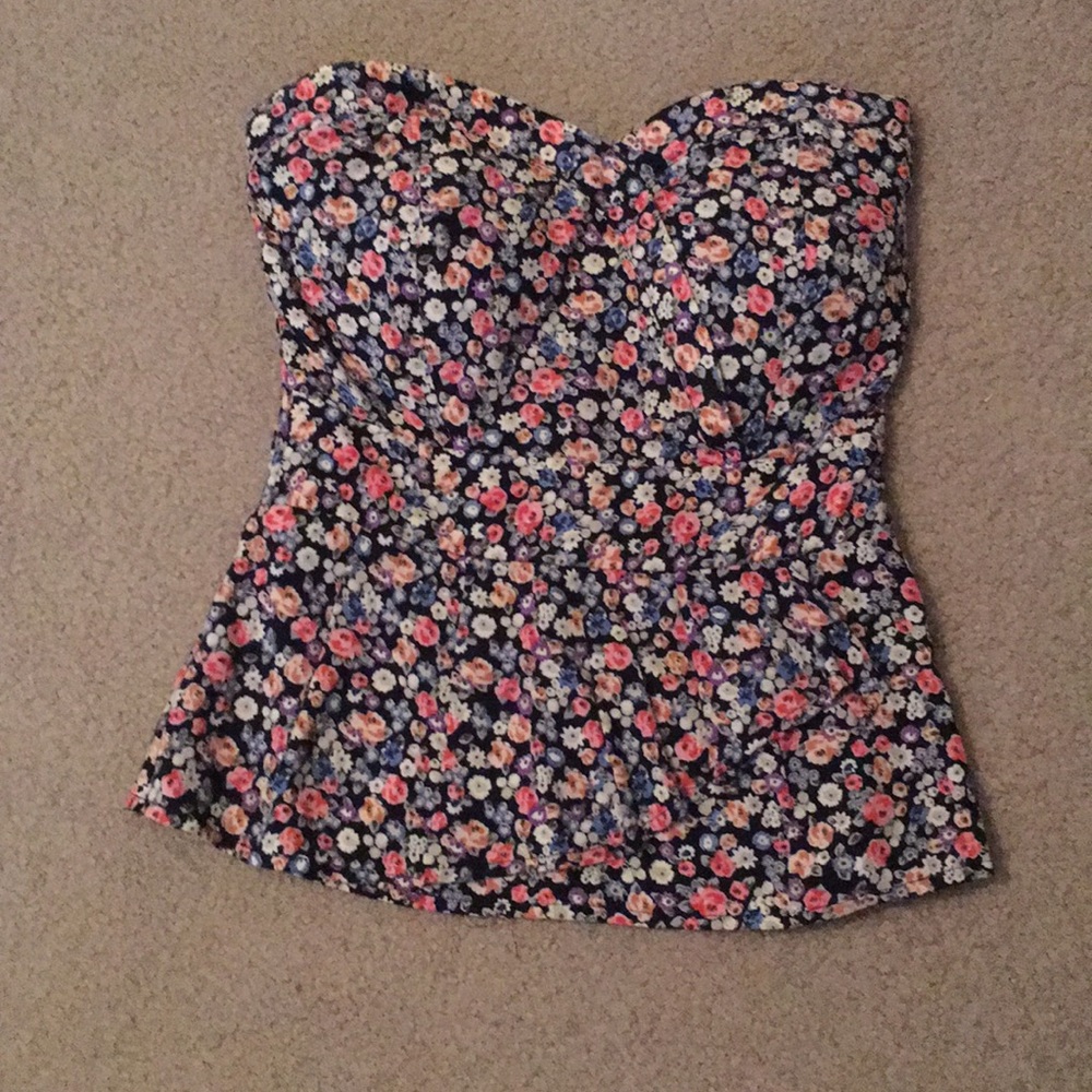 Adorable peplum sleeveless top
